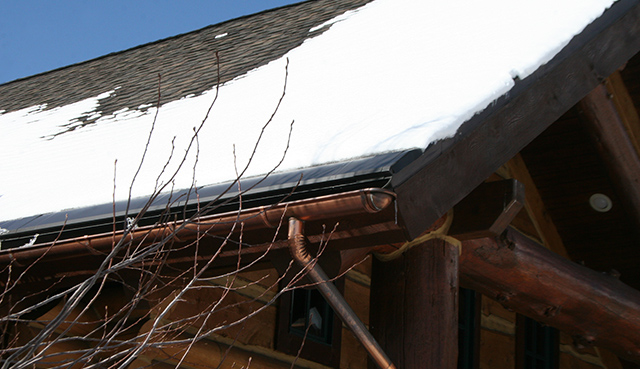 An example of our SnoFree™ Heated Eave systems installed on a shingle roof.